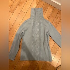 Light blue cashmere by Lorde and Taylor turtleneck sweater with cording detail.